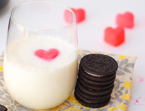 Freeze pink milk in a heart ice cube tray, then place in their milk- Valentine's Day.